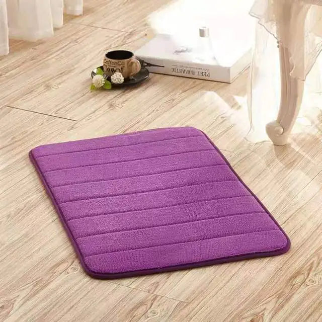 Absorbent bath mat